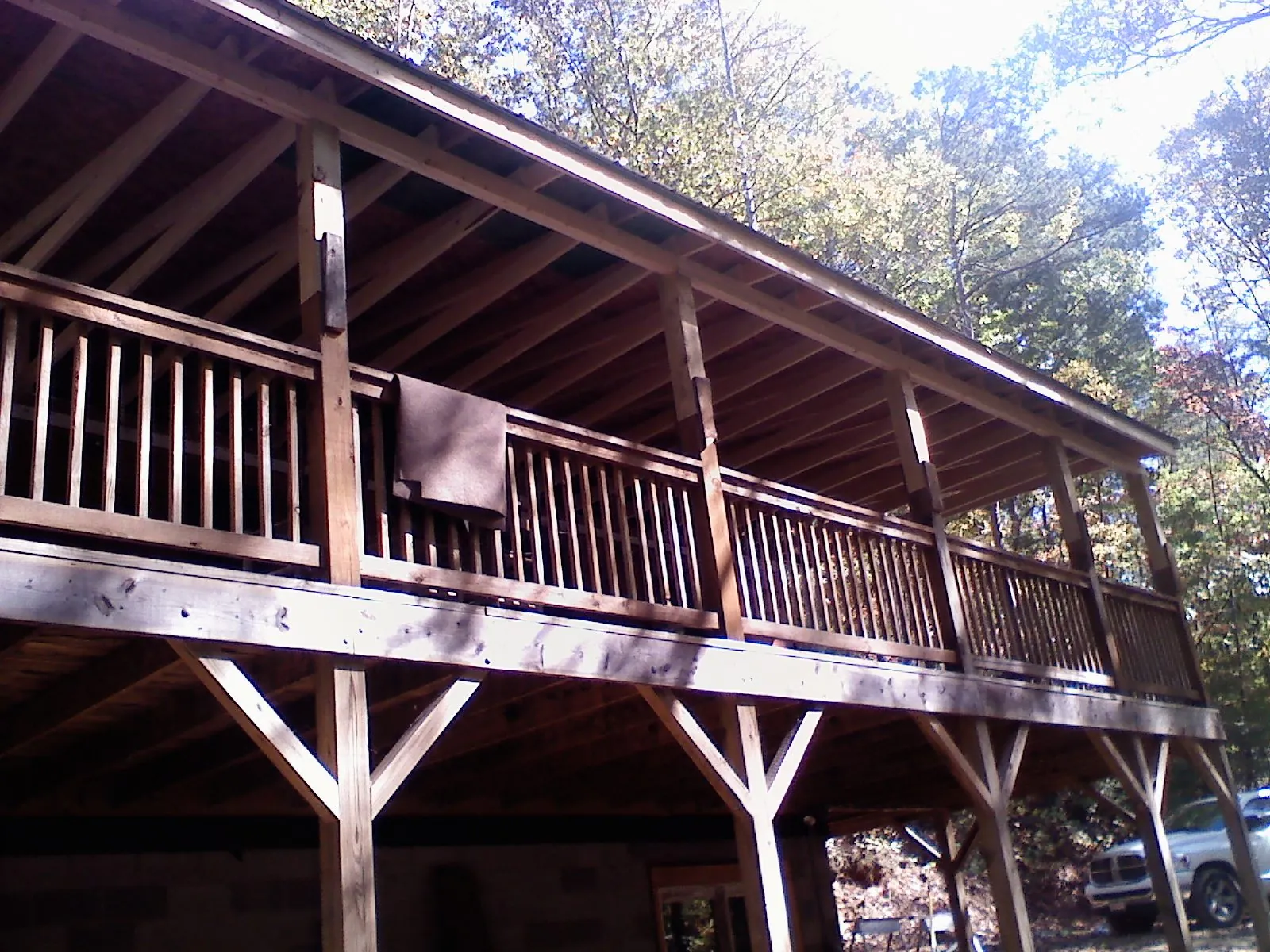 Timber framing under a new elevated porch and deck — Roof Leak Repair in White Stone by Roofing Brothers